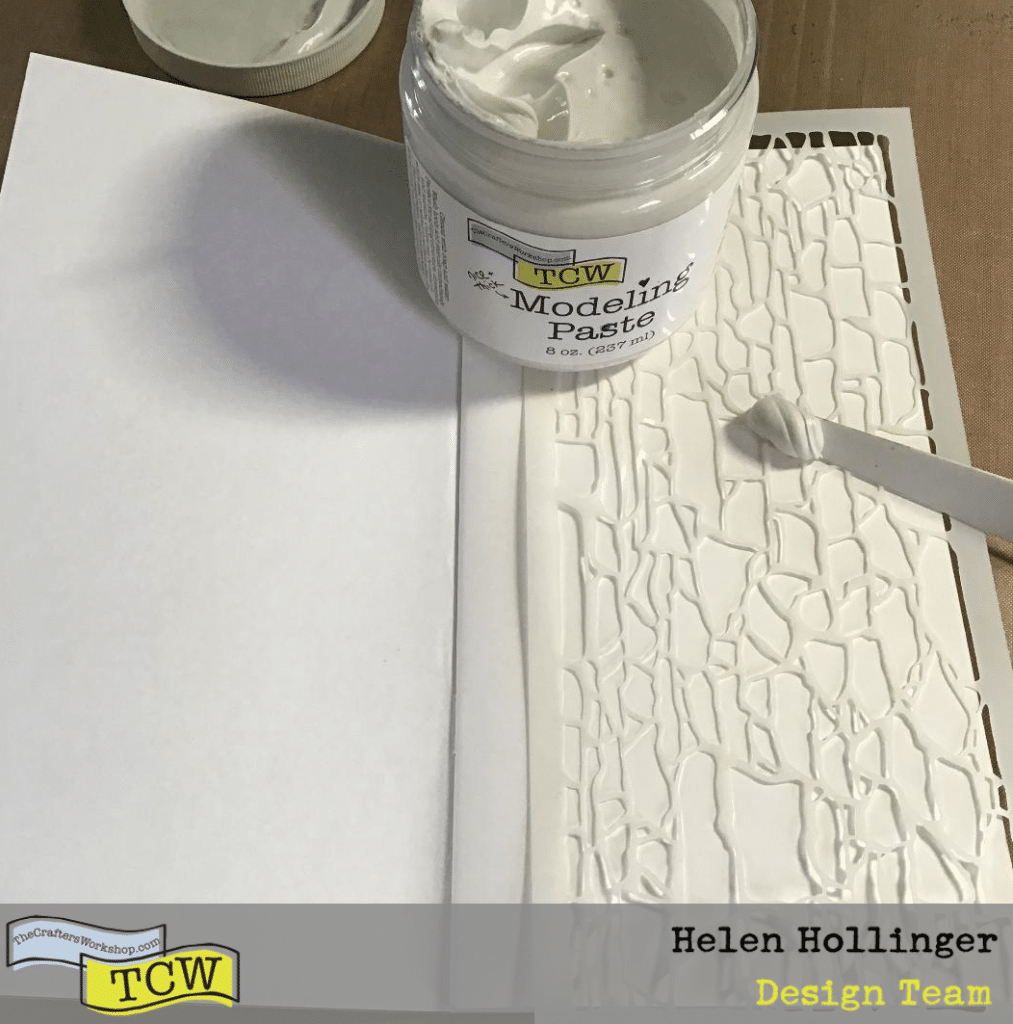 Using TCW9005 Thick Modeling paste and a spatula, I applied a layer of modeling paste at the edges of my pages through TCW2303 Rock Wall Slimline Stencil.