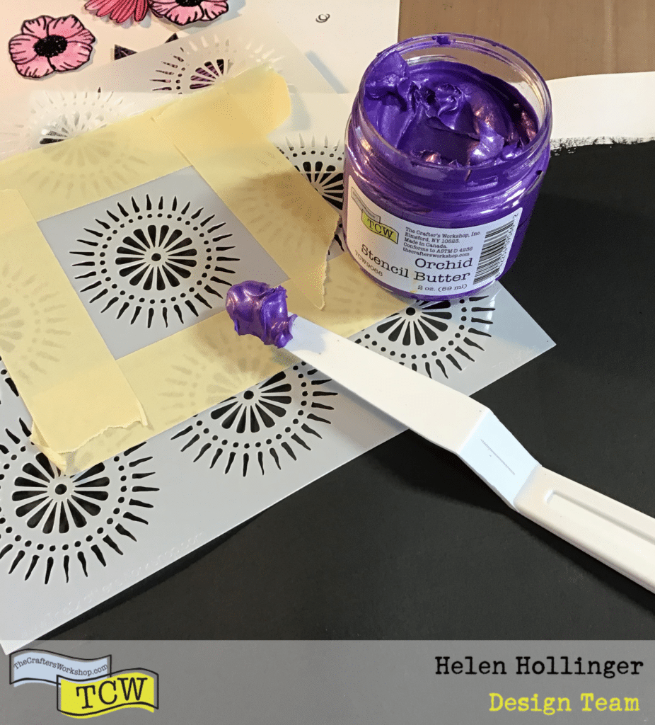 Applying Orchid Stencil Butter through the Petal Burst stencil using a palette knife.