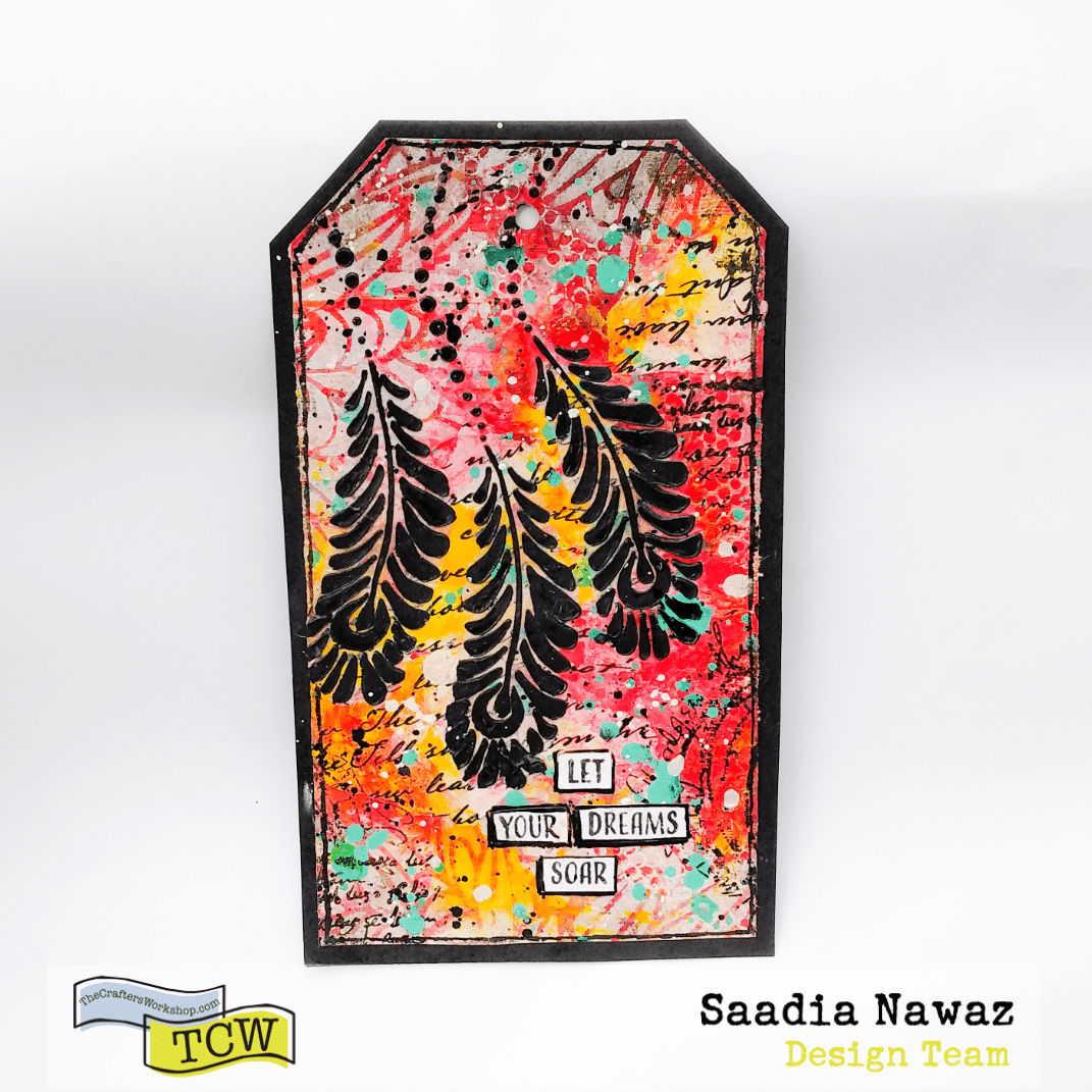 A mixed media art tag with the Crafter's Workshop stencils, acrylic paints and mediums 