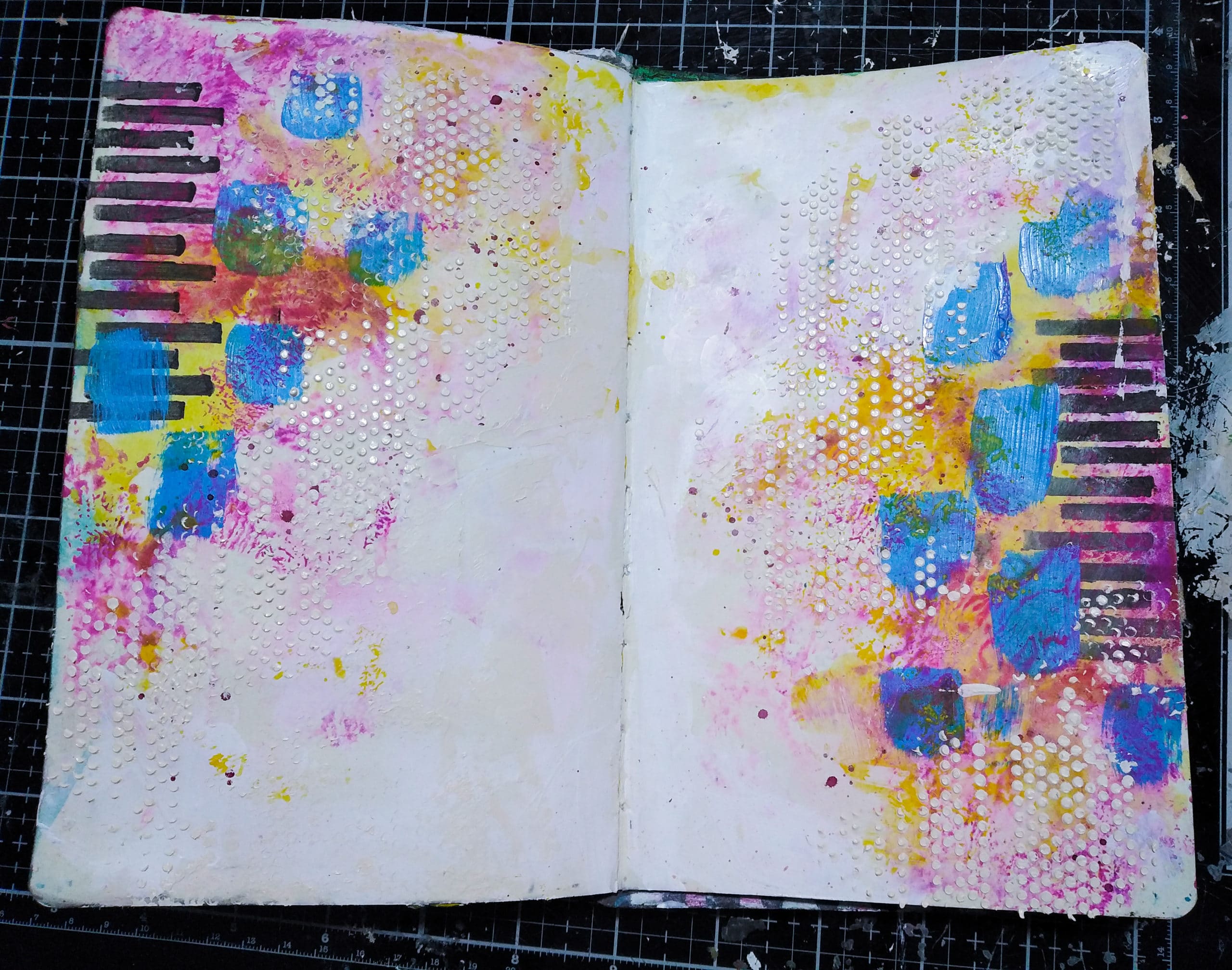 Background texture of mixed media journal spread 